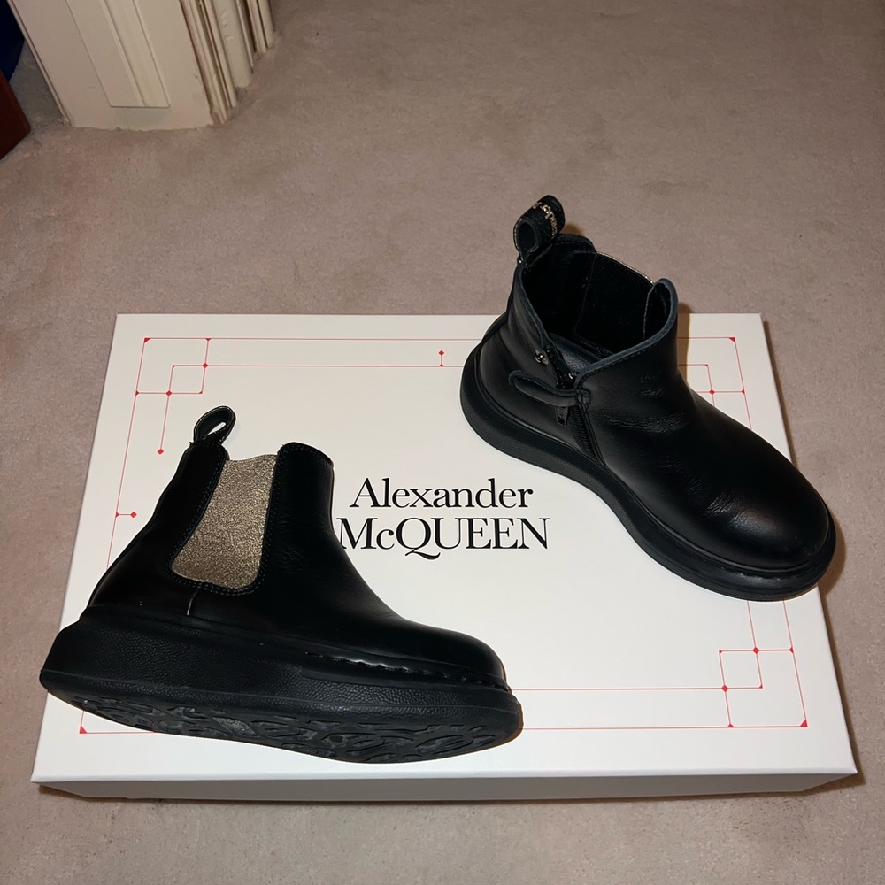 Alexander McQueen toddler boots- “Leather Lug Sole Chelsea” in black & gold.